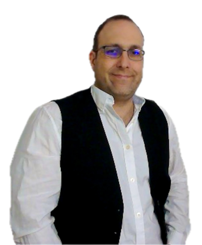 Michael Mees – Inhaber von Ideary Works LLC, trägt eine schwarze Weste über einem weißen Hemd, lächelt und schaut in die Kamera. Michael Mees – Inhaber von Ideary Works LLC, trägt eine schwarze Weste über einem weißen Hemd, lächelt und schaut in die Kamera.